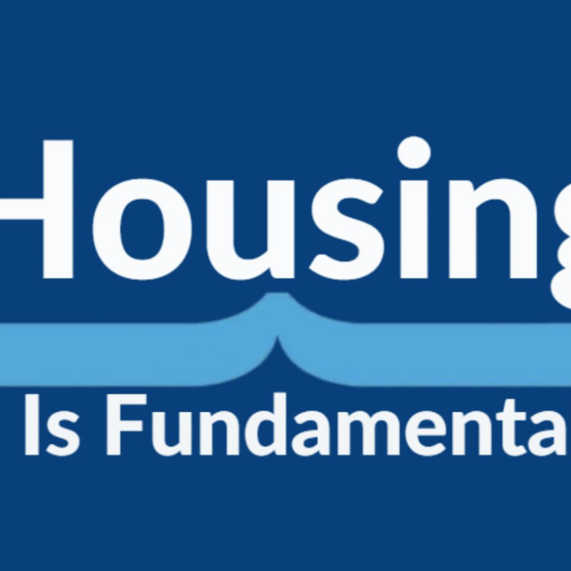 Graphic with the words “Housing Is Fundamental” in white text on a blue background