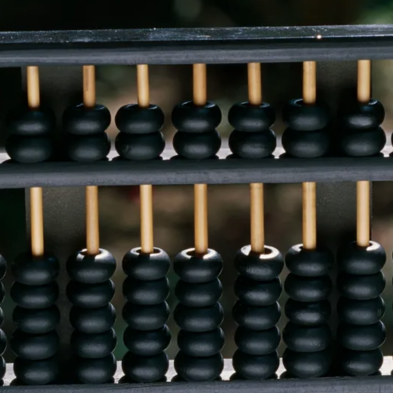 Abacus representing a mortgage calculator and buy vs rent cost comparison